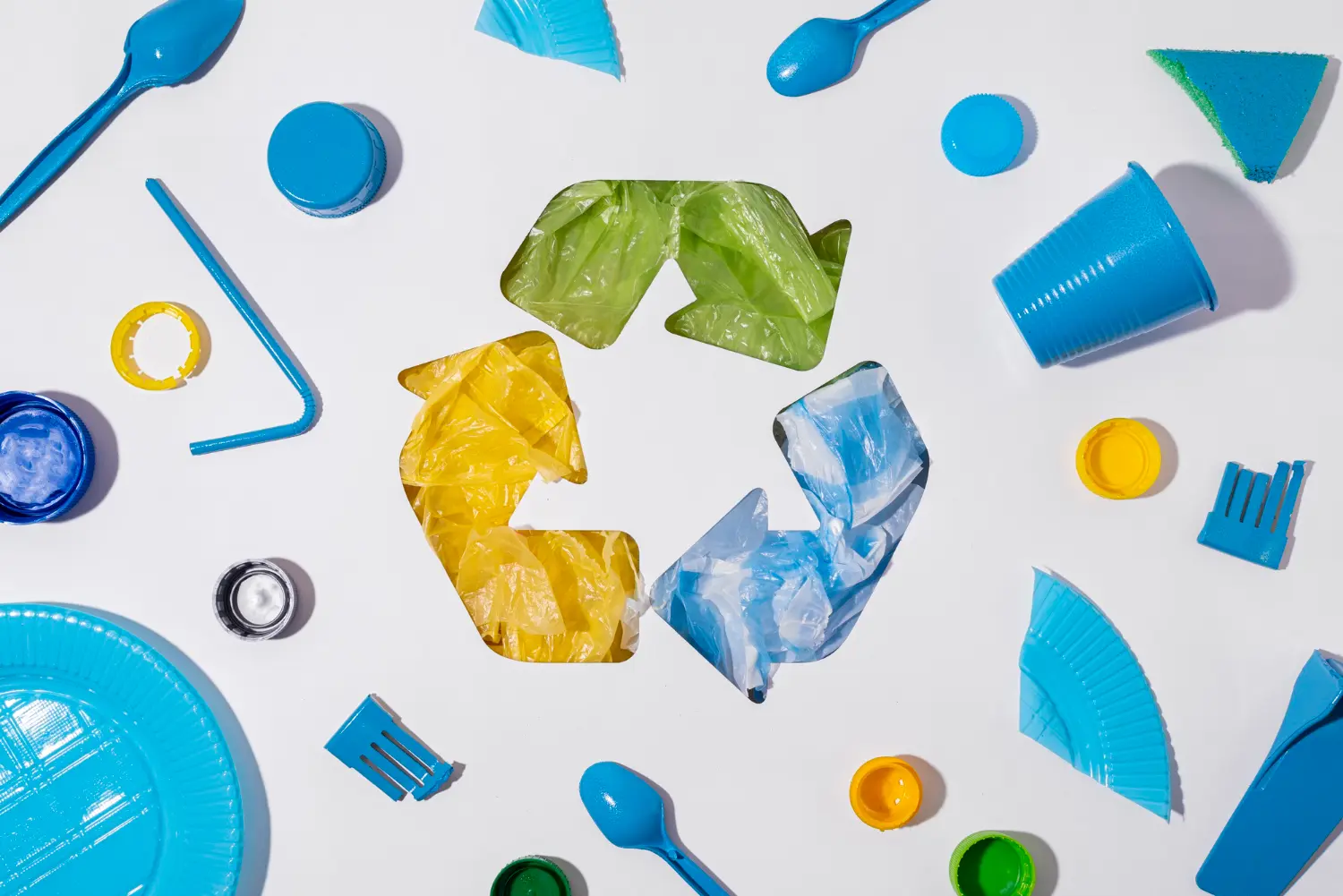 Plastic waste circle with blue background